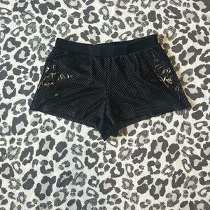 Tripp NYC black shorts with vinyl stars